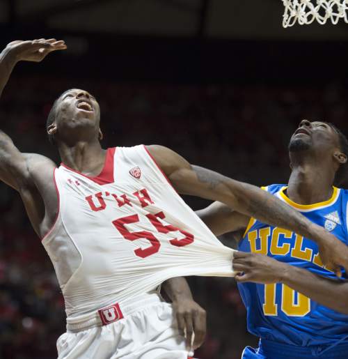 Steve Griffin  |  The Salt Lake Tribune


Utah Utes guard Delon Wright (55) gets grabbed by UCLA Bruins guard Isaac Hamilton (10) and is fouled during first half action in the Utah versus UCLA men's basketball game at the Huntsman Center in Salt Lake City, Sunday, January 4, 2015.