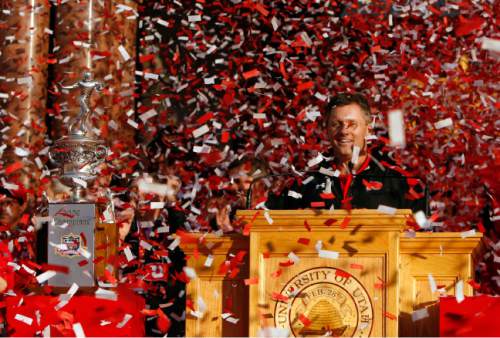 Utah head coach Kyle Whittingham. The University of Utah's unforgettable 2008 football season officially ends Friday afternoon, with a 3 p.m. parade through downtown Salt Lake City for a team that won 13 straight games.The parade included the football team, band, cheerleaders, Swoop and the MUSS marching from the Eagle Gate entrance at the corner of South Temple and State Street to the City County Building at Washington Square. The marchers will tossed red Sugar Bowl beads into the crowd and 10,000 commemorative buttons were distributed.
Players, coach Kyle Whittingham and others will speak at a rally at Washington Square.
  Photo by Leah Hogsten/ The Salt Lake Tribune
SLC  12/9/08
