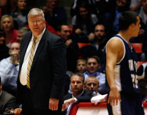 Steve Griffin  |  The Salt Lake Tribune

Salt Lake City - Utah State head coach Stew Morrill scowls at his players late in the game against Utah at the Huntsman Center  in Salt Lake City  Wednesday Nov 18, 2009.