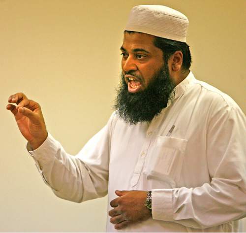 Imam Shuaib Din, speaking at  the Utah Islamic Center in Sandy in 2007, condemned the mass shooting at the offides of a satirical newspaper in Paris. Tribune File Photo