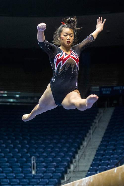 Chris Detrick  |  The Salt Lake Tribune
Utah's Kari Lee competes on the beam during the gymnastics meet at the Marriott Center at Brigham Young University Friday January 9, 2015.