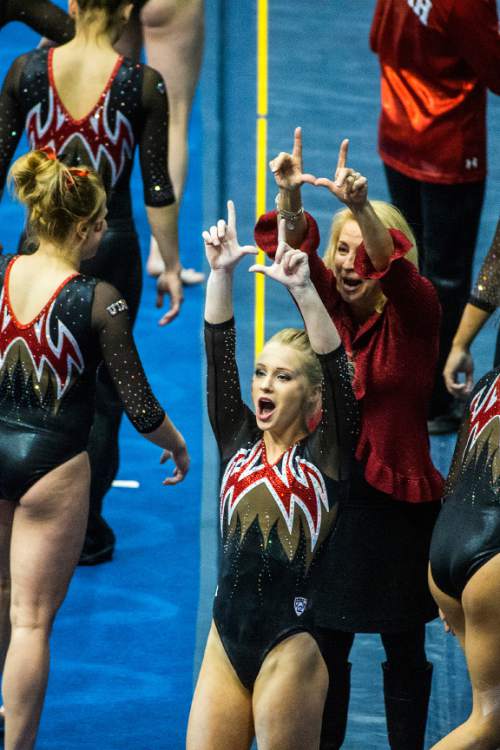 Chris Detrick  |  The Salt Lake Tribune
Utah's Georgia Dabritz and co-head coach Megan Marsden celebrate after Dabritz's vault during the gymnastics meet at the Marriott Center at Brigham Young University Friday January 9, 2015.  Dabritz finished second in the vault with a score of 9.925.