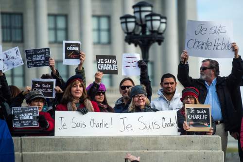 Chris Detrick  |  The Salt Lake Tribune
Members of the French community participate in a rally in support of the Parisian satirical magazine Charlie Hebdo at the Utah State Capitol Saturday January 10, 2015.