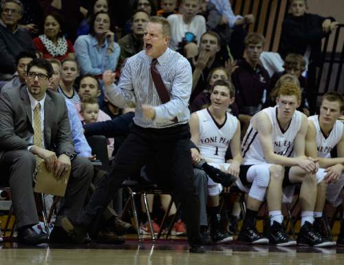 Scott Sommerdorf   |  The Salt Lake Tribune
Lone Peak head coach Quincey Lewis reacts to a score during second half play as Lone Peak defeated Lehi 84-72, Friday, January 9, 2015.