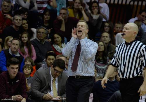 Scott Sommerdorf   |  The Salt Lake Tribune
Lone Peak head coach Quincey Lewis yells to his team  during second half play as Lone Peak defeated Lehi 84-72, Friday, January 9, 2015.