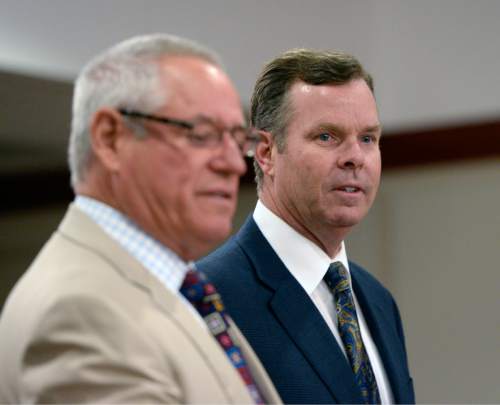 Al Hartmann  |  The Salt Lake Tribune 
Former Attorney General John Swallow, right, and his attorney Stephen McCaughey enter Judge Royal Hansen's courtroom in Salt Lake City Wednesday July 30.  Swallow along with former attorney general Mark Shurtleff are charged with receiving or soliciting bribes, accepting gifts, tampering with evidence, obstructing justice and participating in a pattern of unlawful conduct.