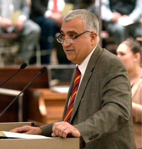 Al Hartmann  |  The Salt Lake Tribune
Salt Lake County Council District Attorney, Sim Gill speaks to gathered at the Salt Lake County Council chamber Monday January 5 after being administered the oath of office.