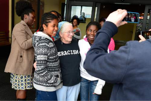 Scott Sommerdorf   |  The Salt Lake Tribune
Olivia Rytting, left, and her sister, Aja, pose for a photo with Joan Mulholland after they had seen the movie "Selma" with her on Saturday. Mulholland was one of the white freedom riders from 1960's.