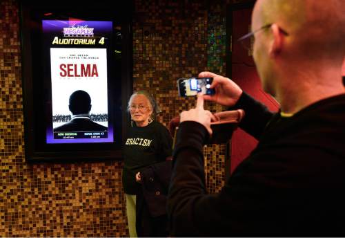Scott Sommerdorf   |  The Salt Lake Tribune
Loki Mulholland makes a photo of Joan Mulholland just before they entered the theater to see "Selma," , Saturday, January 10, 2015. Joan Mulholland was one of the white freedom riders from 1960's.