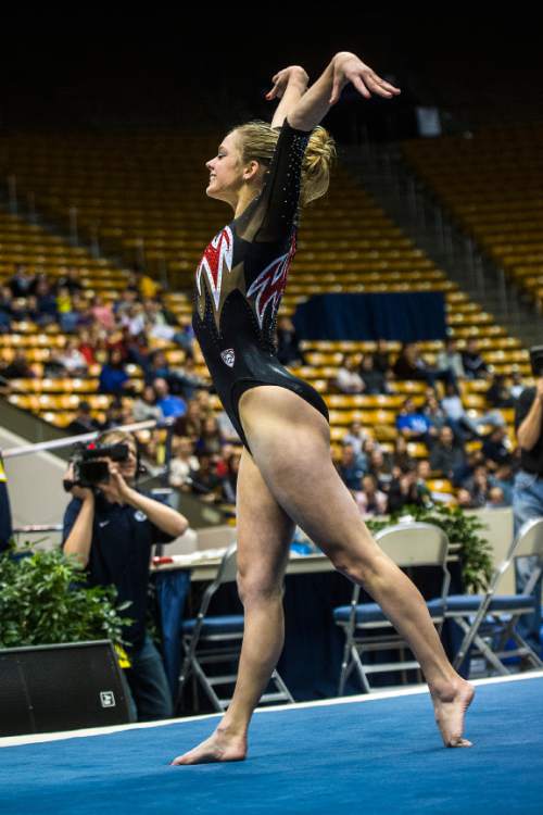 Chris Detrick  |  The Salt Lake Tribune
Utah's Breanna Hughes competes on the floor during the gymnastics meet at the Marriott Center at Brigham Young University Friday January 9, 2015.