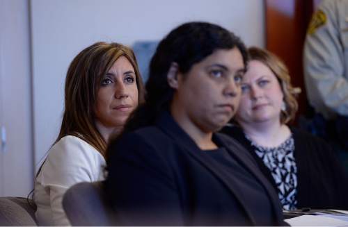 Scott Sommerdorf   |  The Salt Lake Tribune
Jessica Xaiz-Mann, left, listens as Salt Lake County District Attorney Sim Gill speaks about the goals of veterans' court. Third District Court has started a veterans' court for military veterans who have had drug and alcohol problems and low-level run-ins with the law. Judge Royal Hansen presides, Thursday, January 8, 2015.