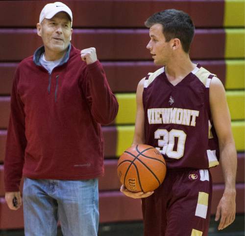 Rick Egan  |  The Salt Lake Tribune

Darin Richins chats with his son, Viewmont  basketball player, Josh Richins, in the Viewmont High Gym, Monday, December 15, 2014