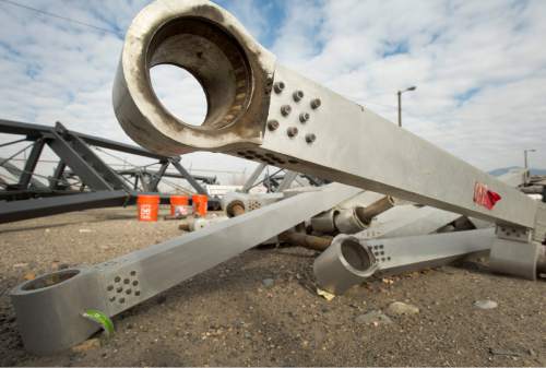Rick Egan  |  The Salt Lake Tribune

The Hoberman Arch, one of the symbols of the 2002 Winter Games, sits among the weeds in Salt Lake City's impound lot, Wednesday, November 12, 2014
