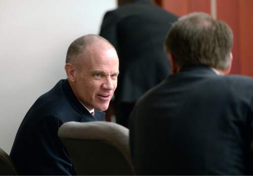 Al Hartmann  |  The Salt Lake Tribune

Marc Sessions Jenson, left, and his brother Stephen R. Jenson talk as they wait for proceedings to begin in Salt Lake City on Wednesday, January 14, 2015. They are charged with defrauding investors in a luxury ski resort near Beaver, Utah.