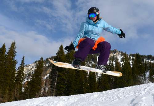 Leah Hogsten  |  The Salt Lake Tribune
"I have so much fun on my adventures that I just always want to keep it going," said Becky Nix of her drive to keep snowboarding every month for the past eight years. Nix catches air Friday, December 5, 2014 at Snowbird Resort on her 110th consecutive month snowboarding.