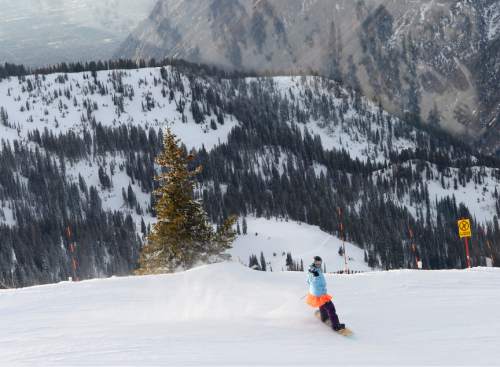Leah Hogsten  |  The Salt Lake Tribune
Becky Nix snowboards Friday, December 5, 2014 off of Hidden Peak at Snowbird Resort on her 110th consecutive month snowboarding.