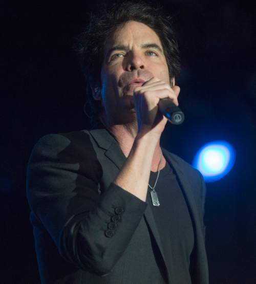 Rick Egan  |  The Salt Lake Tribune

Pat Monahan, sings for Train as at the play   free concert outside EnergySolutions Arena, Saturday, July 26, 2014