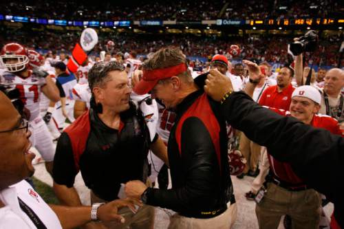Utah head coach Kyle Whittingham and defensive coordinator Gary Anderson celebrate after the Utes defeated Alabama in the 75th annual Sugar Bowl in New Orleans, Friday, January 2, 2009.

Scott Sommerdorf/The Salt Lake Tribune
