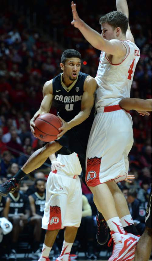 Steve Griffin  |  The Salt Lake Tribune


Colorado Buffaloes guard Askia Booker (0) gets caught in the air as Utah Utes forward Jakob Poeltl (42) blocks his path during second half action in the Utah versus Colorado men's basketball game at the Huntsman Center in Salt Lake City, Wednesday, January 7, 2015.