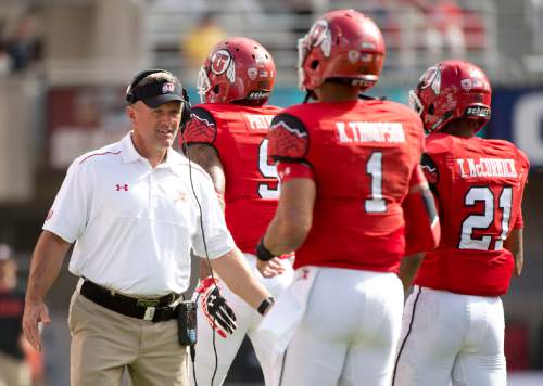 Jeremy Harmon  |  The Salt Lake Tribune

Kyle Whittingham congratulates members of his team as they leave field as the Utes host the Bulldogs at Rice-Eccles Stadium on Saturday, Sept. 6, 2014.