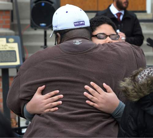 Steve Griffin  |  The Salt Lake Tribune

Westminster College freshman student Tanesha Tyler, of Logan, hugs her father, Charles Tyler, after she sang and read two original poems at the start Westminster College's annual march in honor of Dr. Martin Luther King Jr. in Salt Lake City, Monday, January 19, 2015.