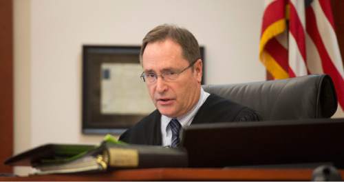 Steve Griffin  |  The Salt Lake Tribune

Judge Randall N. Skanchy sentences Christen Spencer to life in prison without the possibility of parole for killing 84-year-old Shirley Sharp and setting her house on fire to cover up the crime. Skancy sentenced him at the Matheson Courthouse in Salt Lake City, Tuesday, January 20, 2015.