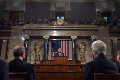 President Barack Obama delivers his State of the Union address to a joint session of Congress on Capitol Hill on Tuesday, Jan. 20, 2015, in Washington. (AP Photo/Mandel Ngan, Pool)