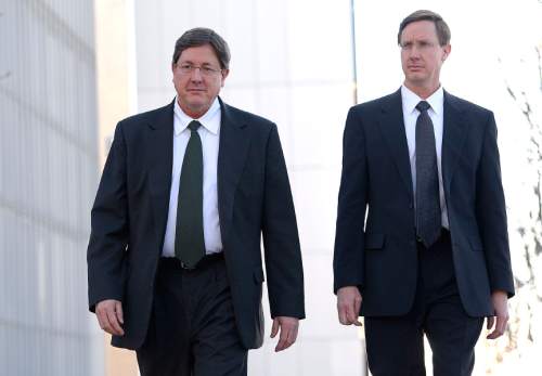 Leah Hogsten  |  The Salt Lake Tribune
l-r Lyle Jeffs, believed to be the FLDS bishop in Hildale, Utah, and Colorado City, Arizona, and Nephi Jeffs appeared in U. S. District Court in Salt Lake City, Wednesday, January 21, 2015. Both men, who are Warren Jeffs' brothers, have been served subpoenas in a U.S. Department of Labor lawsuit against Paragon Contractors, that provided labor for the Southern Utah Pecan Ranch near Hurricane. Both businesses are owned by members of the FLDS. Labor department investigators, according to court documents, believe that as many as 1,400 school-age children and their parents participated in the harvest.