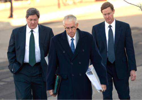 Leah Hogsten  |  The Salt Lake Tribune
l-r Lyle Jeffs, believed to be the FLDS bishop in Hildale, Utah, and Colorado City, Arizona, FLDS attorney Jim Bradshaw and Nephi Jeffs appeared in U. S. District Court in Salt Lake City, Wednesday, January 21, 2015. Both men, who are Warren Jeffs' brothers, have been served subpoenas in a U.S. Department of Labor lawsuit against Paragon Contractors, that provided labor for the Southern Utah Pecan Ranch near Hurricane. Both businesses are owned by members of the FLDS. Labor department investigators, according to court documents, believe that as many as 1,400 school-age children and their parents participated in the harvest.