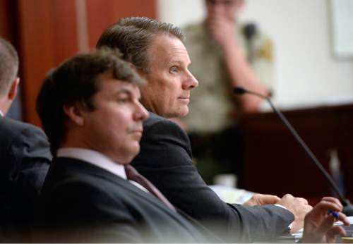 Al Hartmann  |  The Salt Lake Tribune

Stephen R. Jenson, center, listens to opening arguments with his lawyer Edward Stone in Salt Lake City on Wednesday, January 14, 2015.  Trial began today for Jenson and his brother Marc Sessions Jenson who are charged with defrauding investors in a luxury ski resort near Beaver, Utah.