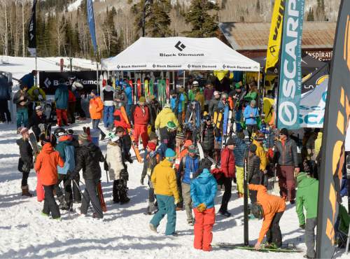 Al Hartmann  |  The Salt Lake Tribune
Outdoorsmen from the Winter Market Outdoor Retailers pack the equipment display booths at Solitude Mountain Resort for the All Mountain Demo on Tuesday. The demo day gives retailers the opportunity to test gear in the environment it was made for to make informed buying decisions.