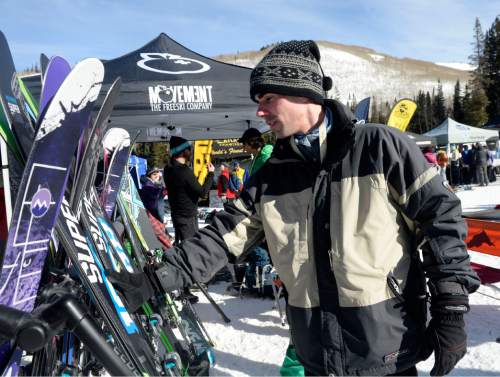 Al Hartmann  |  The Salt Lake Tribune
Alan Perryman, owner of AlpineExtreme.Co out of Boseman, Mont., an outdoor company that caters to backcountry gear for "alpine addicts," checks out a pair of skis from the Movement Freeski Company at the Winter Market Outdoor Retailers at Solitude Mountain Resort for the All Mountain Demo Tuesday Jan. 20, 2015. The demo day gives retailers the opportunity to test gear in the environment it was made for to make informed buying decisions.