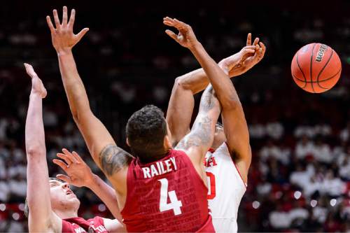 Trent Nelson  |  The Salt Lake Tribune
Washington State Cougars center Jordan Railey (4) puts an arm in the face of Utah Utes forward Chris Reyes (20) as the University of Utah Utes host the Washington State Cougars, college basketball at the Huntsman Center in Salt Lake City, Wednesday January 21, 2015.