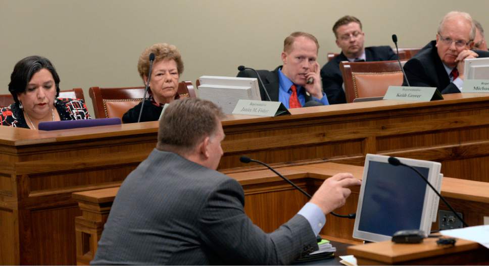 Al Hartmann  |  The Salt Lake Tribune 
Senator Curtis Bramble, bottom, testifies in the House Government Operation Standing Committee Monday March 3 on SB005401, Elections Amendments.  He was the sponsor of the bill.  The amended bill passed unananimously in the committee to bring it to the house floor.   Many on the committee had reservations but voted for the so-called "Utah count my vote" compromise bill.