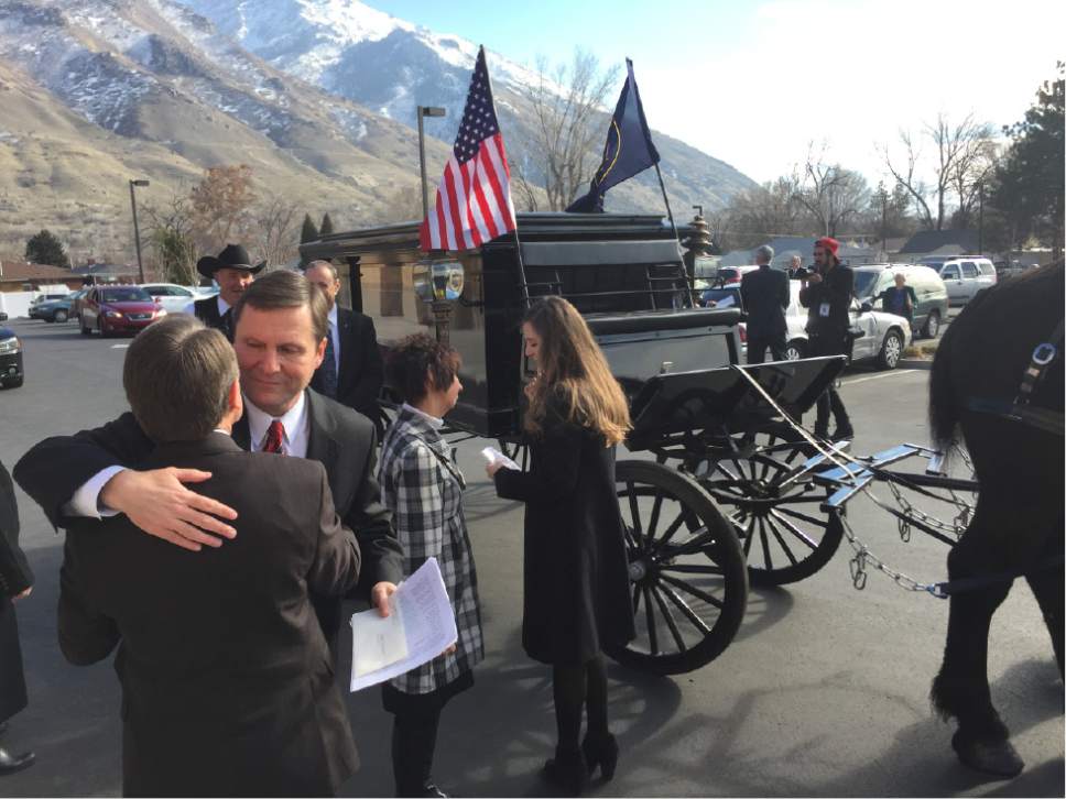 Matt Canham  |  The Salt Lake Tribune 

Stan Lockhart greets well wishers after the funeral of his wife Becky Lockhart, Utah's former House Speaker, on Friday.