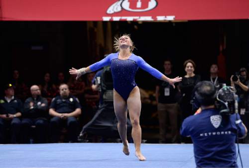 Scott Sommerdorf   |  The Salt Lake Tribune
UCLA's Samantha Peszek during her floor routine. Utah Gymnastics defeated UCLA 196.725 - 194.725 in the Huntsman Center, Friday, January 23, 2015.
