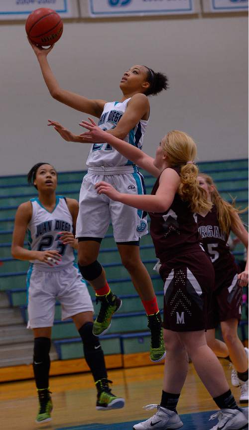 Leah Hogsten  |  The Salt Lake Tribune
Juan Diego's Monique Mills hits the net. Juan Diego High School girls basketball team leads Morgan High School 32-27 at the half, Friday, January 16, 2015.