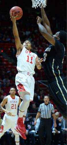 Steve Griffin  |  The Salt Lake Tribune


Utah Utes guard Isaiah Wright (1) lays the ball in for a basket during first half action in the Utah versus Colorado men's basketball game at the Huntsman Center in Salt Lake City, Wednesday, January 7, 2015.