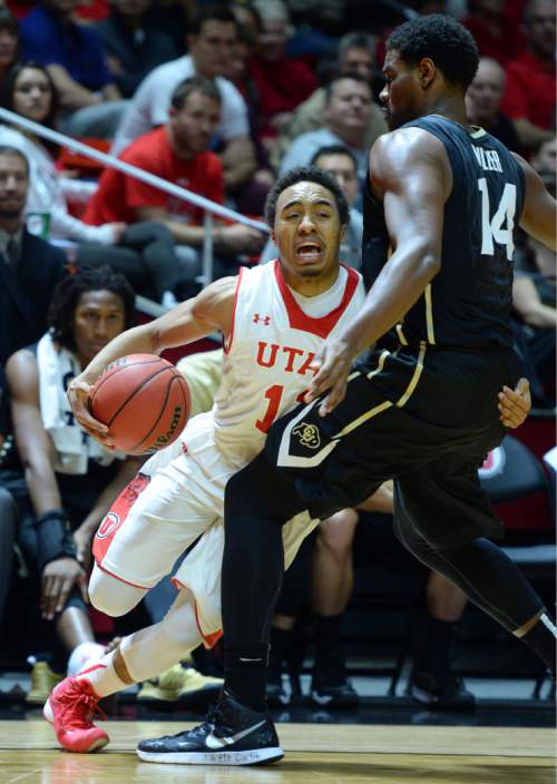 Steve Griffin  |  The Salt Lake Tribune


Utah Utes guard Brandon Taylor (11) gets trapped in the corner by Colorado Buffaloes forward Tory Miller (14) during first half action in the Utah versus Colorado men's basketball game at the Huntsman Center in Salt Lake City, Wednesday, January 7, 2015.