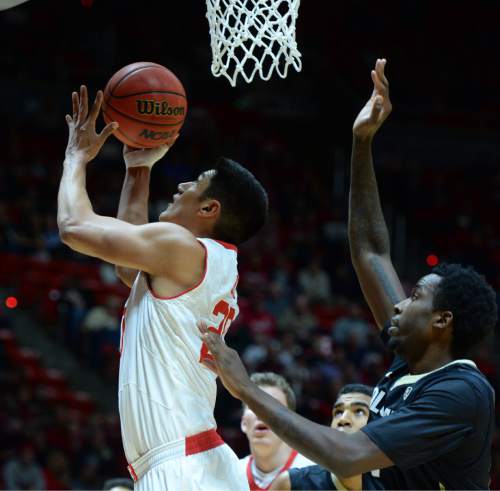 Steve Griffin  |  The Salt Lake Tribune


Utah Utes forward Chris Reyes (20) gets passed Colorado Buffaloes forward Wesley Gordon (1) for two points during first half action in the Utah versus Colorado men's basketball game at the Huntsman Center in Salt Lake City, Wednesday, January 7, 2015.