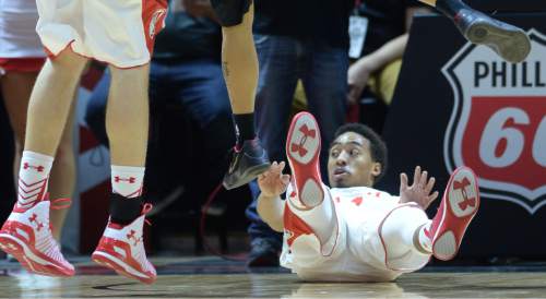 Steve Griffin  |  The Salt Lake Tribune


Utah Utes guard Isaiah Wright (1) slides backwards after getting knocked down during first half action in the Utah versus Colorado men's basketball game at the Huntsman Center in Salt Lake City, Wednesday, January 7, 2015.