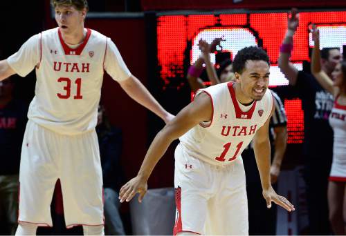 Scott Sommerdorf   |  The Salt Lake Tribune
Utah Utes G Brandon Taylor (11) grimaces after he had his eye poked late in the second half as Utah beat Washington 77-56 at the Hunstman Center, Sunday, January 25, 2015.