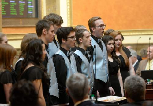 Al Hartmann  |  The Salt Lake Tribune
Members of the Corner Canyon High School Chamber Singers provide music in the Utah House of Representatives for the start of the 2015 legislative session Monday Jan 26.