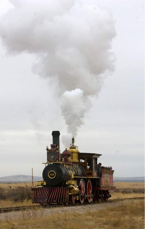 Al Hartmann  |  The Salt Lake Tribune
Union Pacific steam locomotive 199 rolls down the track to the Golden Spike National Historic Site visitor center in northwestern Utah Wednesday December 28.   Golden Spike holds its annual Winter Steam Festival on December 28-30 Folks can get up close to tour the locomotive cab, see steam demonstrations as well as take a ride on a muscle powered handcart.