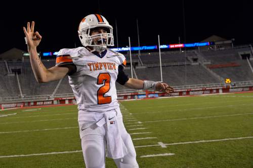 Chris Detrick  |  The Salt Lake Tribune
Timpview's Britain Covey (2) celebrates after winning the 4A state championship game at Rice-Eccles Stadium Friday November 21, 2014.