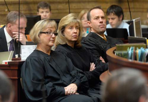 Al Hartmann  |  The Salt Lake Tribune
Justice Christine M. Durham, left, Justice Jill N. Parrish and Associate Chief Justice Thomas R. Lee listen to Matthew Durrant, chief justice of the Utah Supreme Court, give the annual State of the Judiciary address in the Utah House of Representatives Monday Jan. 26, 2015.