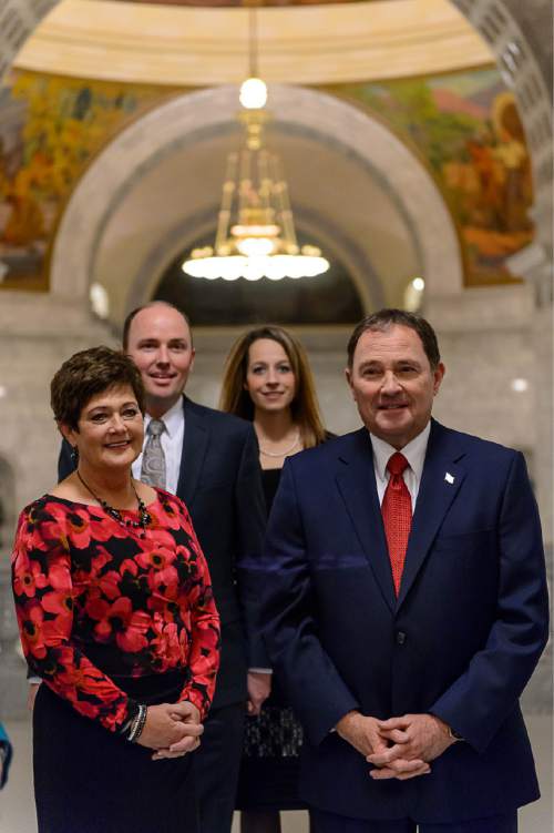 Trent Nelson  |  The Salt Lake Tribune
Governor Gary Herbert, right, waits to enter the House Chamber to deliver the state of the state address at the state capitol building in Salt Lake City, Wednesday January 28, 2015. Left to right are Jeanette Herbert, Lieutenant Governor Spencer Cox, Abby Cox, Governor Gary Herbert.