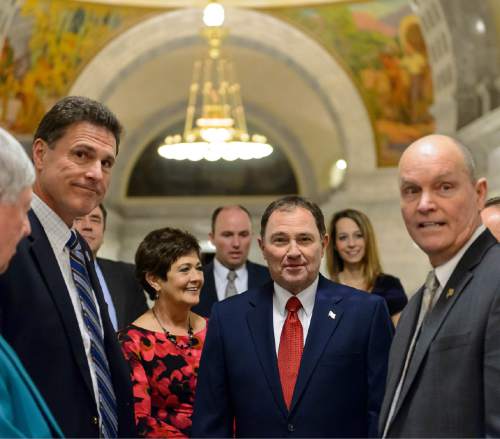 Trent Nelson  |  The Salt Lake Tribune
Governor Gary Herbert, center, waits to enter the House Chamber to deliver the state of the state address at the state capitol building in Salt Lake City, Wednesday January 28, 2015.