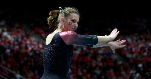 Lennie Mahler  |  The Salt Lake Tribune
Baely Rowe scores a 9.85 on her floor routine during a super meet at the Huntsman Center on Friday, Jan. 16, 2015.