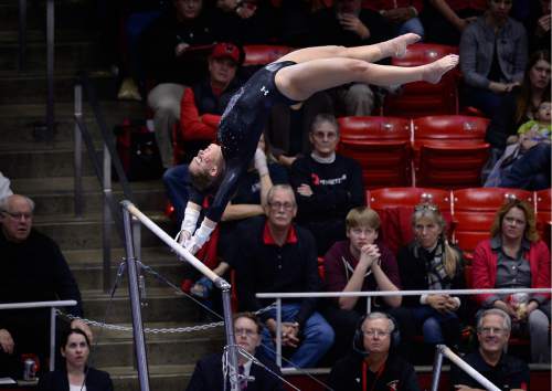 Scott Sommerdorf   |  The Salt Lake Tribune
Baely Rowe during her 9.750 routine on the bars as Utah Gymnastics defeated UCLA 196.725 - 194.725 in the Huntsman Center, Friday, January 23, 2015.